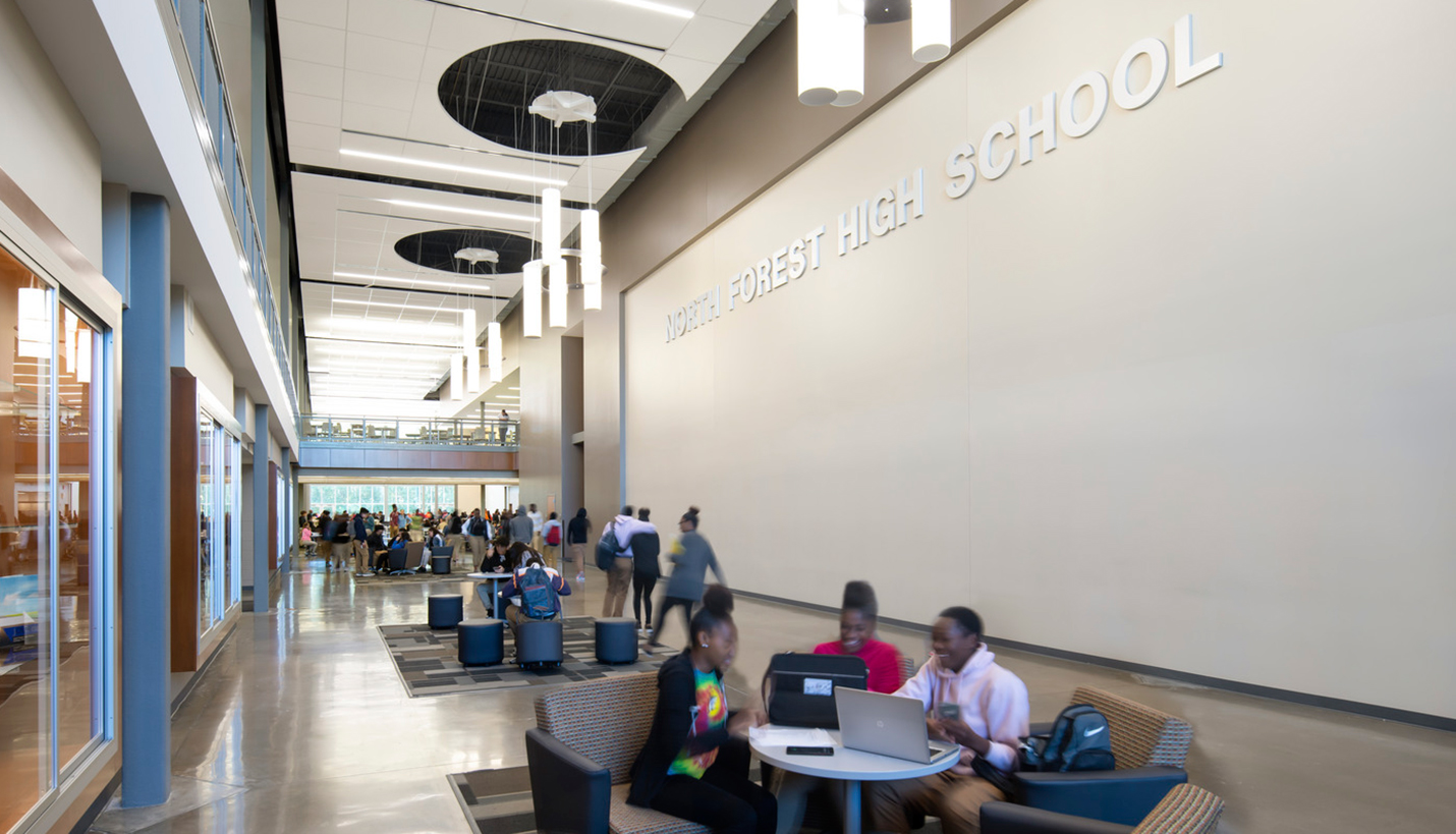 Central circulation spines at large campuses like Houston ISD North Forest High School can help enhance safety by increasing staff’s ability to visually supervise large areas. - © Mariella & Luis Ayala