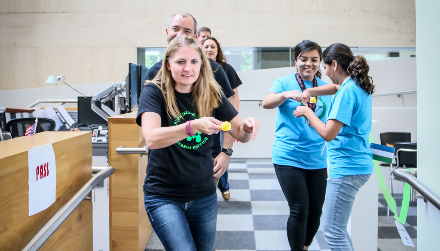 Page Employees race to the finish in the 50-ish Meter Relay. - Andy Phan