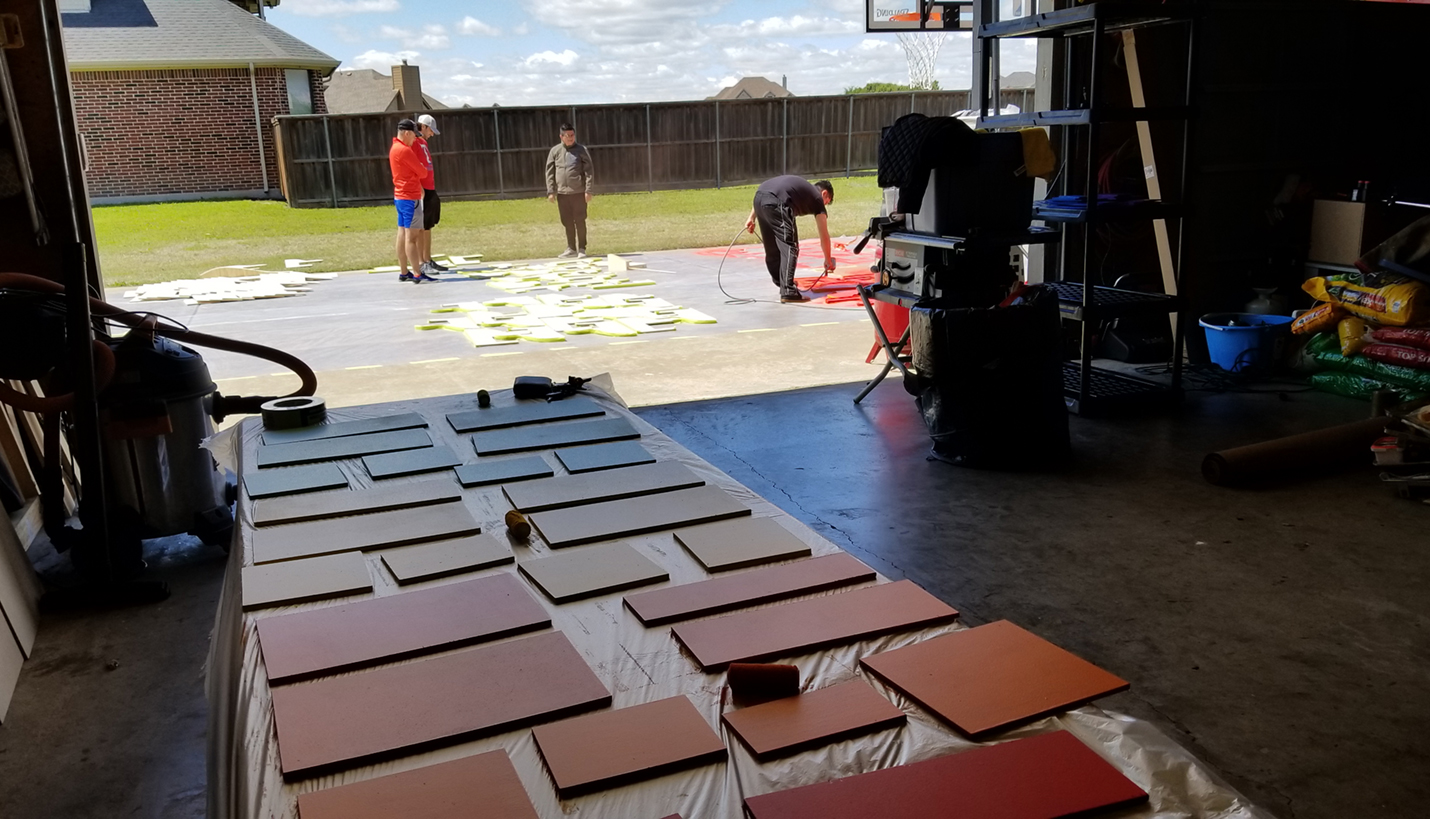 The Page team spent their free time carving, painting and assembling the pieces to make the bi-folding library bench on display at AIA Dallas RETROSPECT 2018. - Page