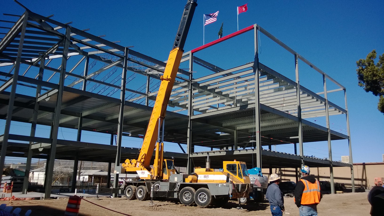 The ceremonial topping beam at the Gayle Greve Hunt School of Nursing was painted Page red. - 