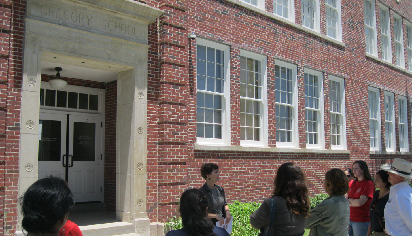 Wendy Heger gives a tour of the historic Gregory School, an African-American archival research center. She oversaw the renovation project. - 